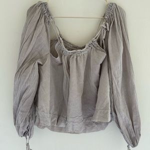 Free people loose long sleeve top with fun cut outs